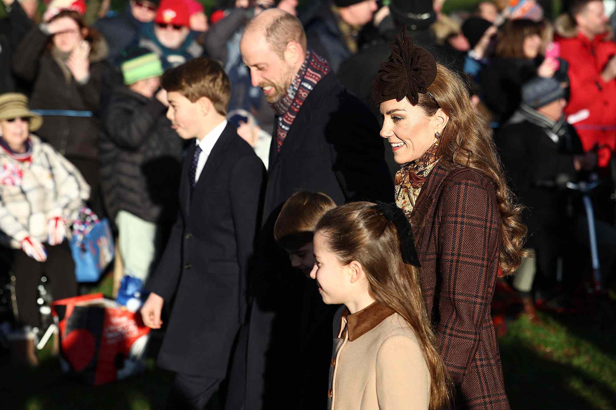 Kate Middleton and Prince William bundle up as they join royal Christmas walk with George, Charlotte and Louis