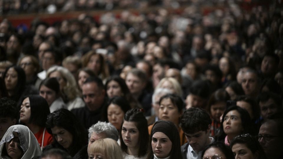 Faithfull attend the Christmas mass at St Peter's Basilica in the Vatican. - Tiziana Fabi/AFP/Getty Images