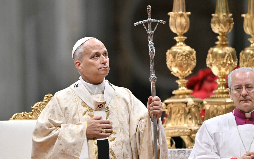 In 1st Christmas mass, Pope Leo laments 'rain, wind, cold' facing ...