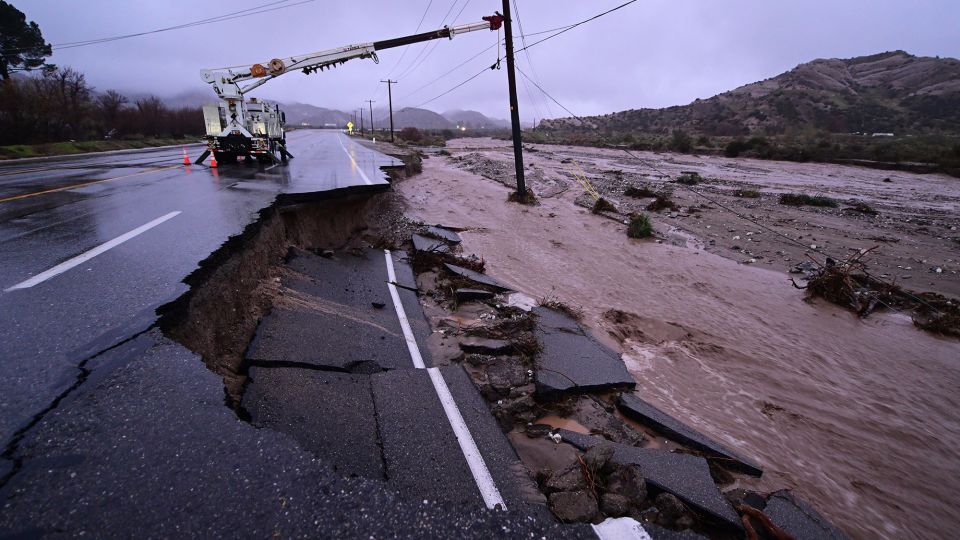 Part of California State Route 138 washes away from flooding Wednesday, outside of Wrightwood, California. - Wally Skalij/AP