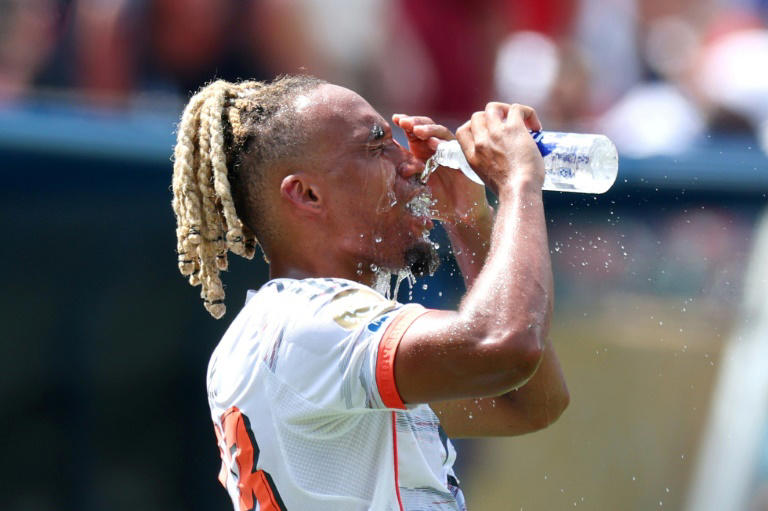 Bayern Munich player Sacha Boey cools off during a hydration break at this year's FIFA Club World Cup, where searing temperatures proved challenging for players