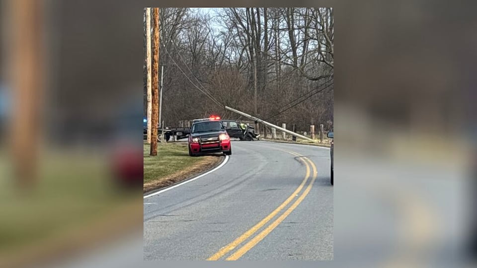 Man taken to hospital after crashing into pole