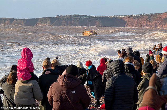 Anger grows over decision to go ahead with Christmas Day swim where two  disappeared in rough seas