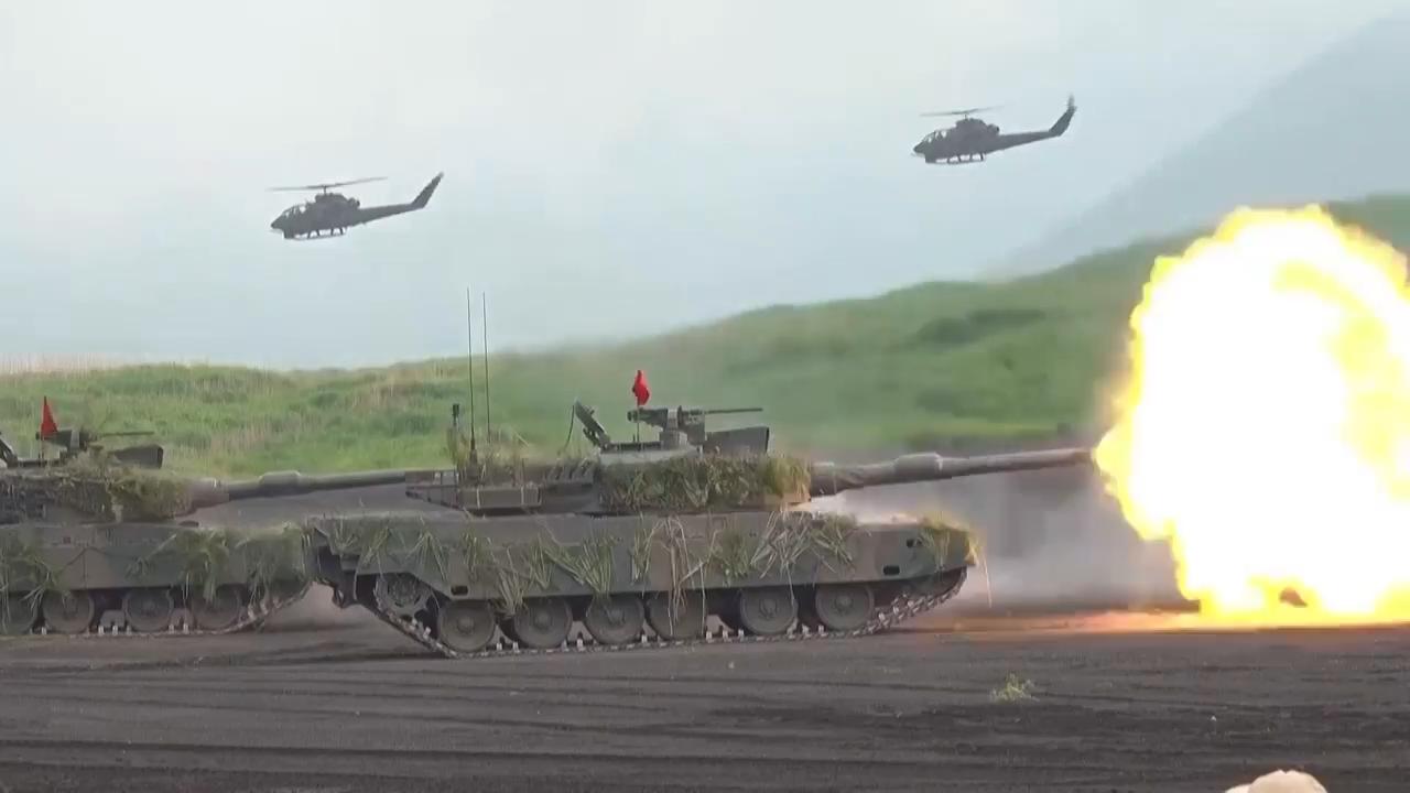 Japan's cabinet approves record defense budget that aims to deter China ...
