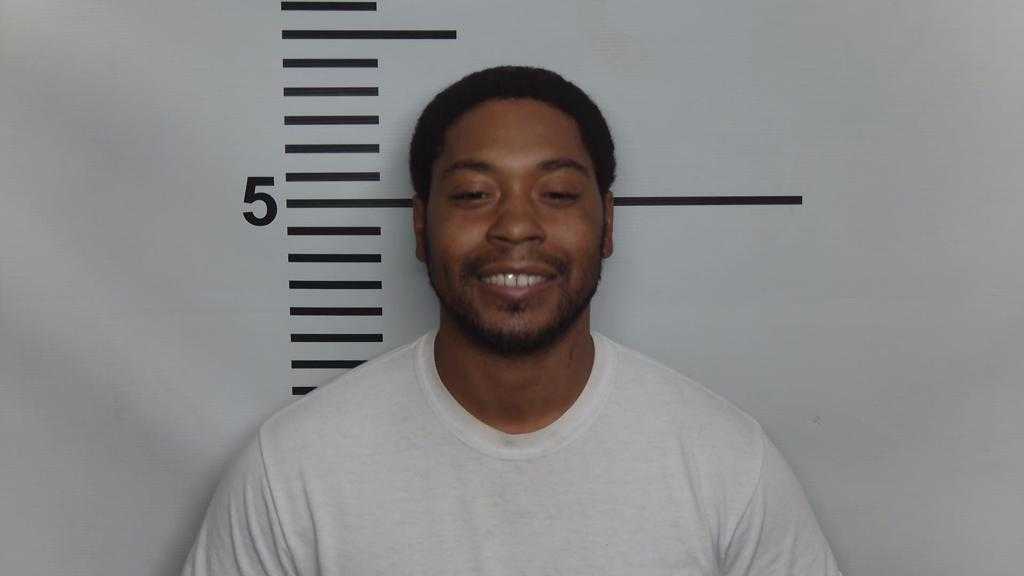 Armed man shot by LMPD officer in Russell neighborhood booked into jail