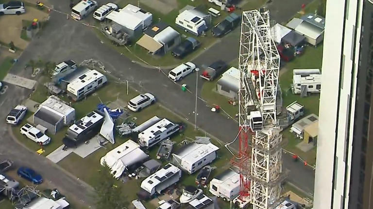Further delays expected to remove snapped crane hovering over caravan park
