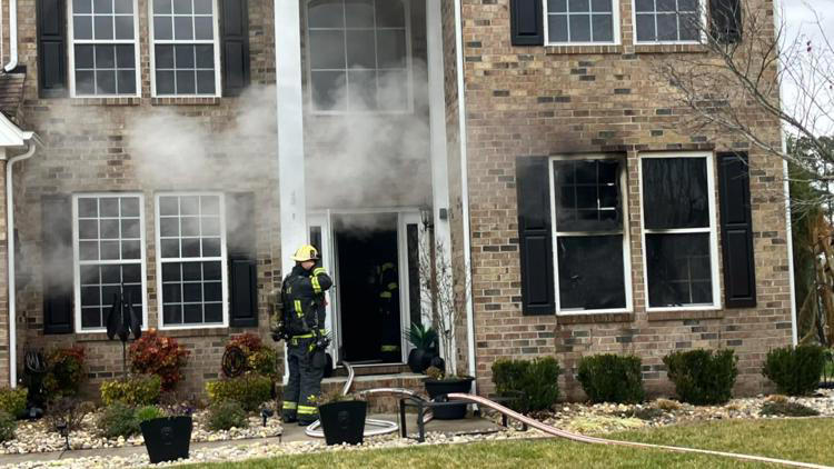 2 people displaced after house fire in Suffolk