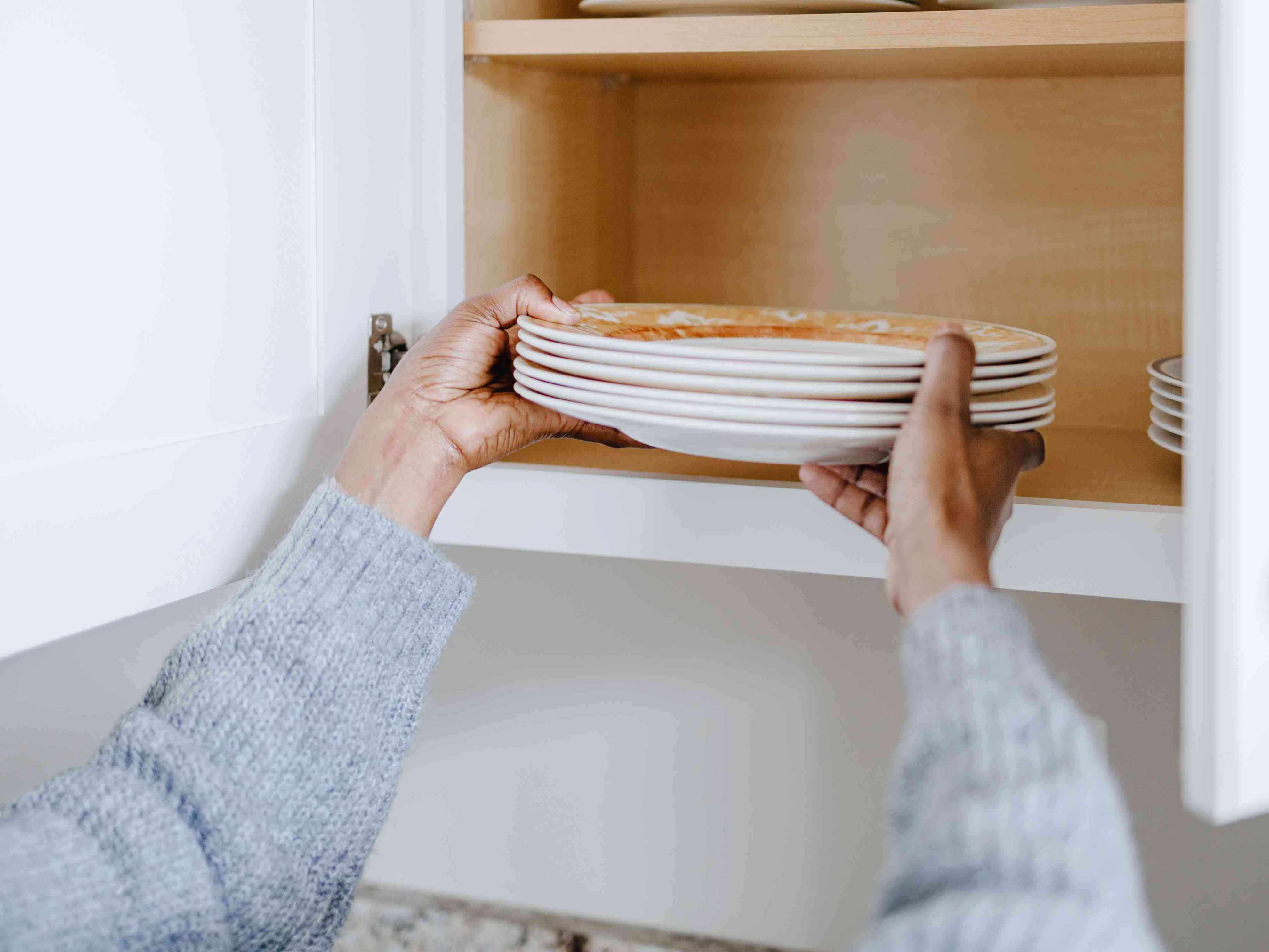 My aunt taught me not to store plates on cabinet shelves—here’s why