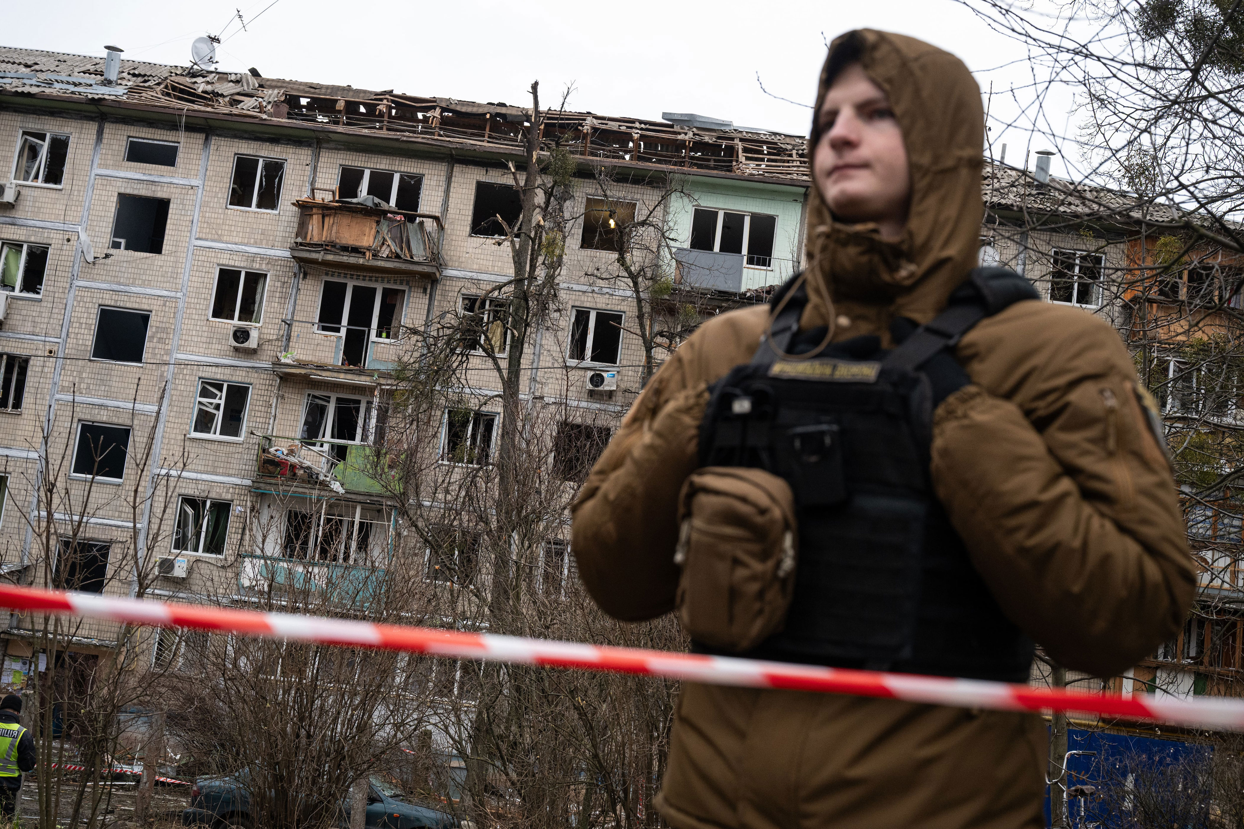 A view of damage at the site of a Russian drone attack in Kyiv on December 23, 2025. / Danylo Antoniuk/Anadolu via Getty Images
