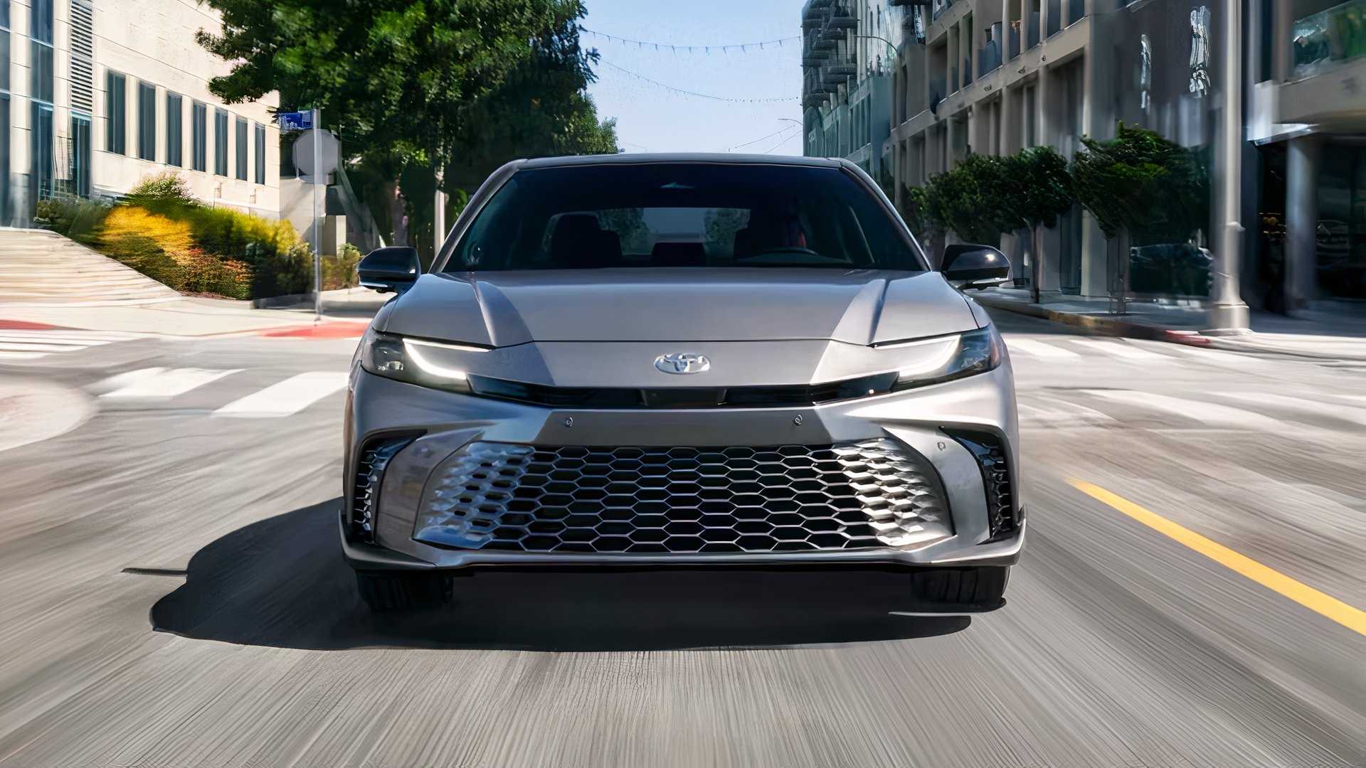 2026 Toyota Camry in silver being driven