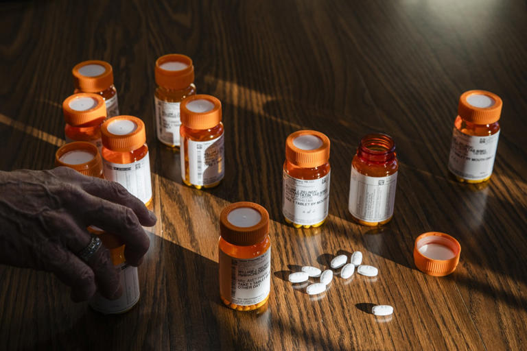 Zielinski with some of his supply of atorvastatin.