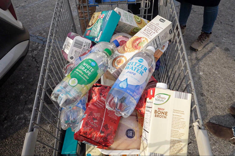 Brittany Zwier and Frank Martinez's grocery cart at Aldi. The chain does not provide traditional supermarket shopping bags. (NBC News)