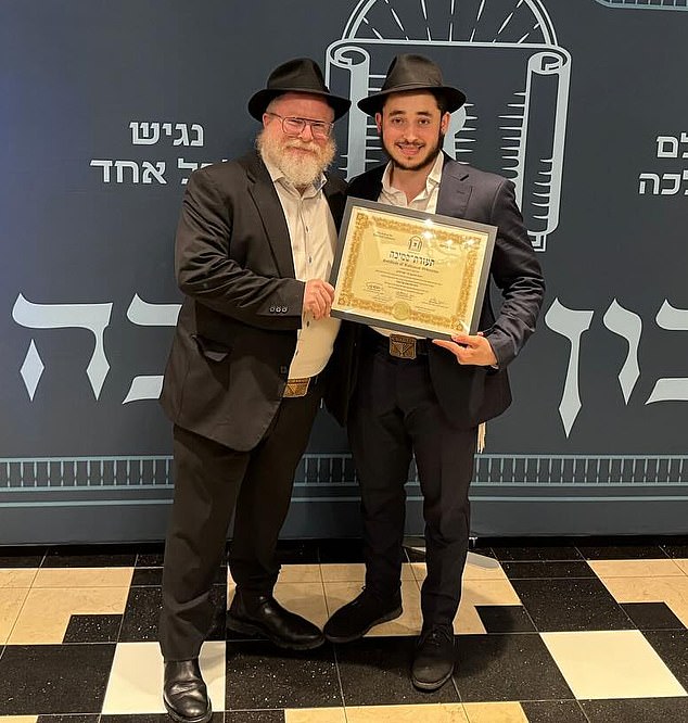 Rabbi who protected a cop during the Bondi Beach shooting is pictured ...