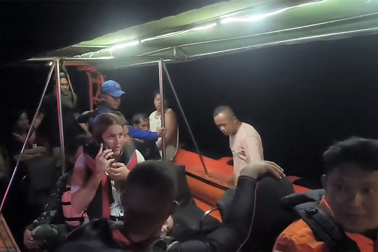 Handout/BASARNAS/AFP via Getty A photo of search and rescue teams evacuating foreign tourists in the waters of Padar Island