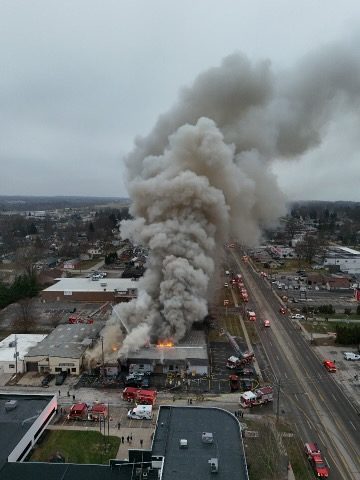Crews battle fire at Millcreek business complex
