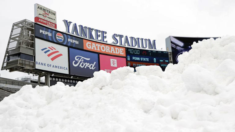 Snow is seen piled up on the field before the Pinstripe Bowl NCAA college football game between Clemson and Penn State at Yankee Stadium Saturday, Dec. 27, 2025, in New York. (AP Photo/Adam Hunger) - Adam Hunger/AP