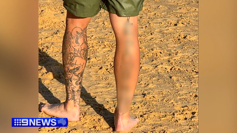 Father charged after allegedly showing Nazi tattoos on Newcastle beach