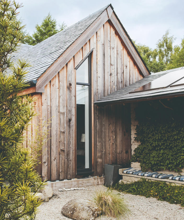 Couple turn run-down barn into future-proofed home built to let them ...