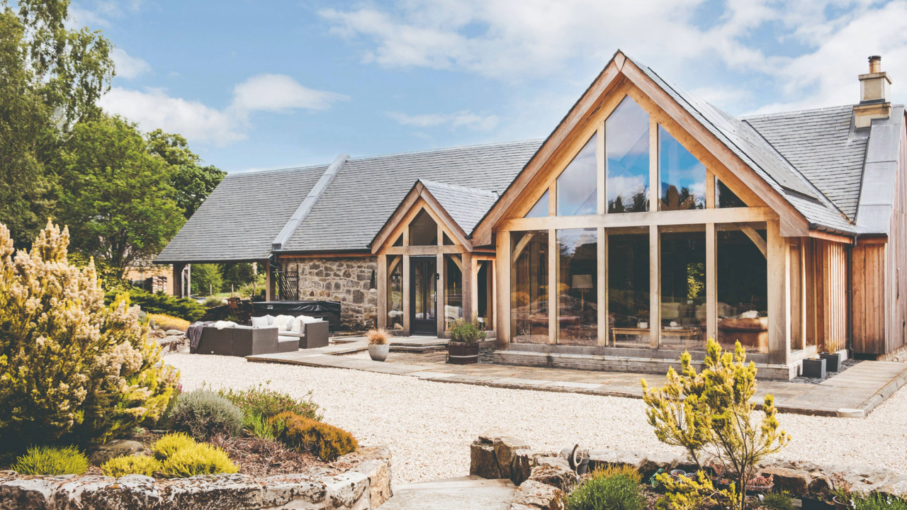 Couple turn run-down barn into future-proofed home built to let them ...