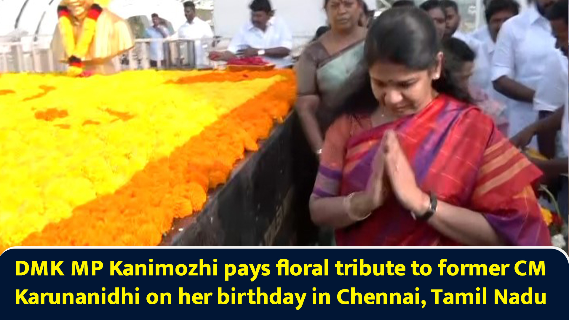 DMK MP Kanimozhi pays floral tribute to former CM Karunanidhi on her ...