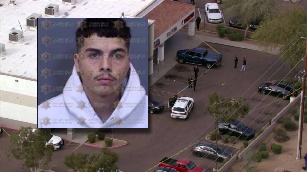 Suspects in custody after 2 men shot outside north Phoenix strip mall