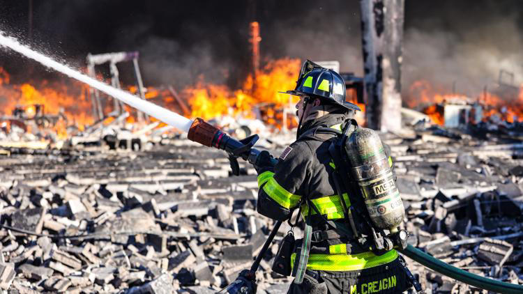 Memphis firefighter injured after massive fire at Frayser Flea Market