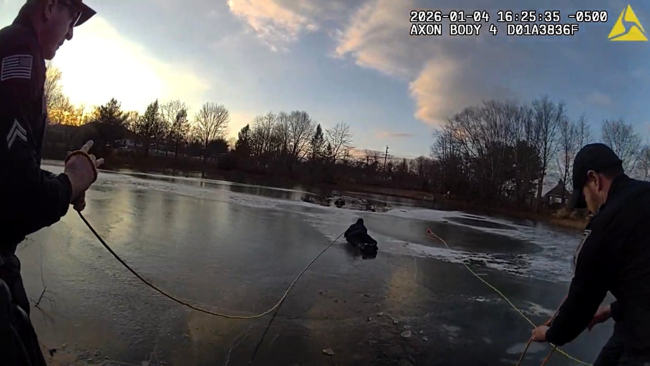 Boy stuck in icy pond screams for help prompting officers’ daring ...