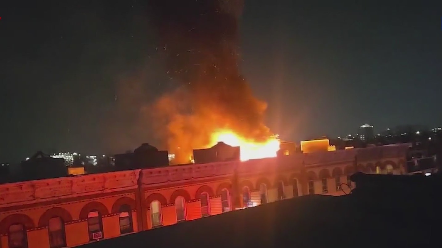 Firefighters injured in battle against massive apartment fire in Queens