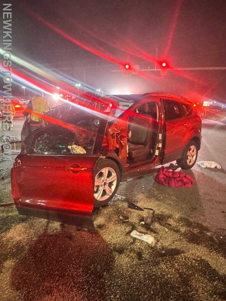 Crews cut door off SUV to free trapped driver after collision with work ...