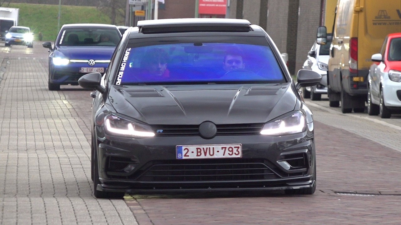 Volkswagen Golf R driving low through city streets