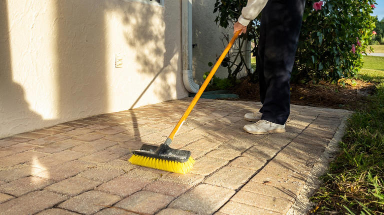 The easy & affordable way to prevent weeds from growing between pavers