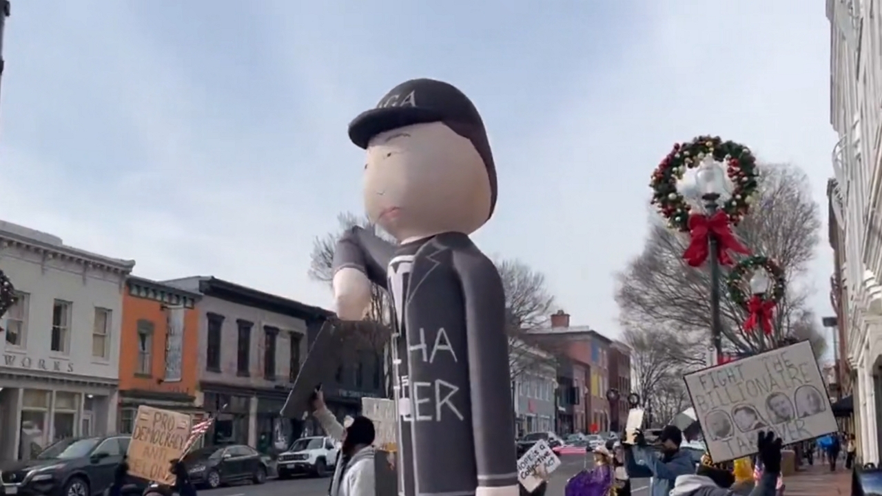 Tesla takedown protest targets Elon Musk imagery in Washington, DC, USA<br><br>