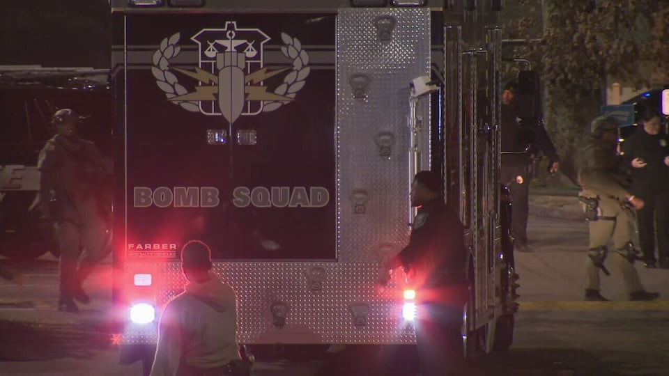 Man in custody after SWAT situation, holding victim at gunpoint, police say