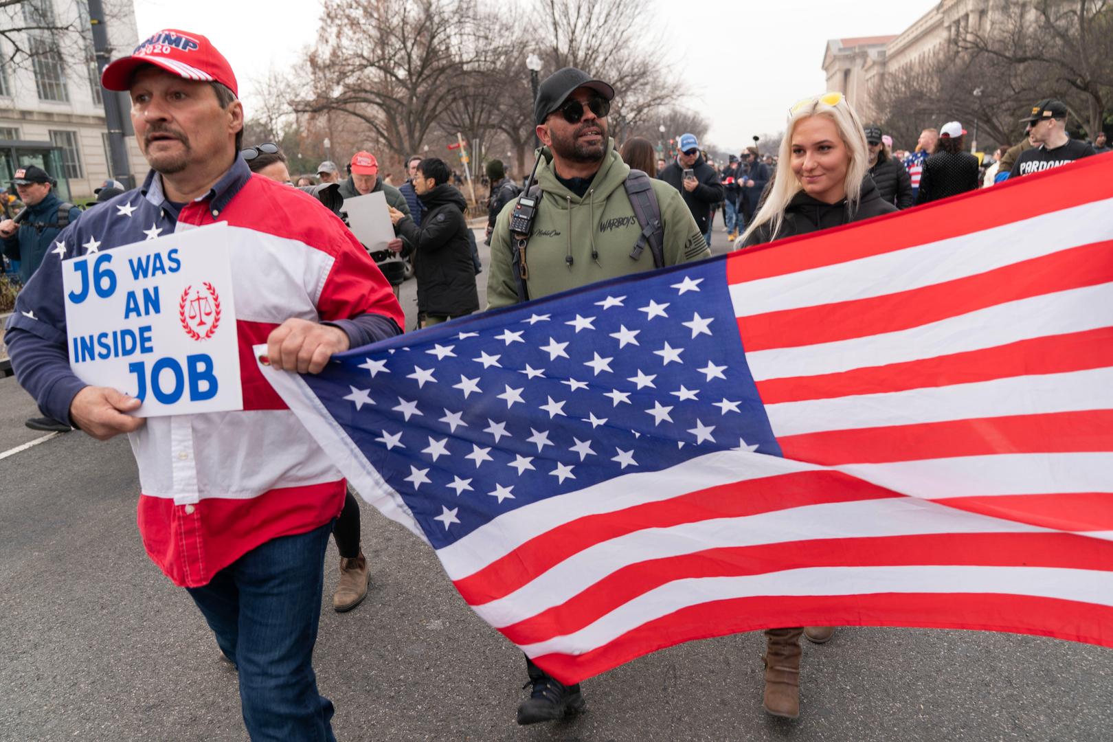Jan. 6 defendants and supporters march to the Capitol