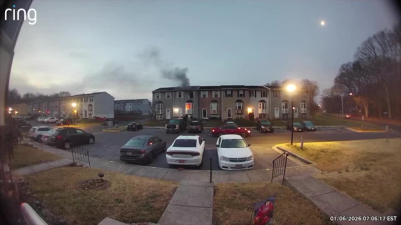 Caught on camera: Neighbor saves family from burning home