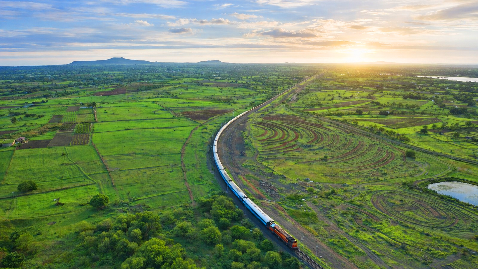 Railway lines cutting through the fields of Maharashtra