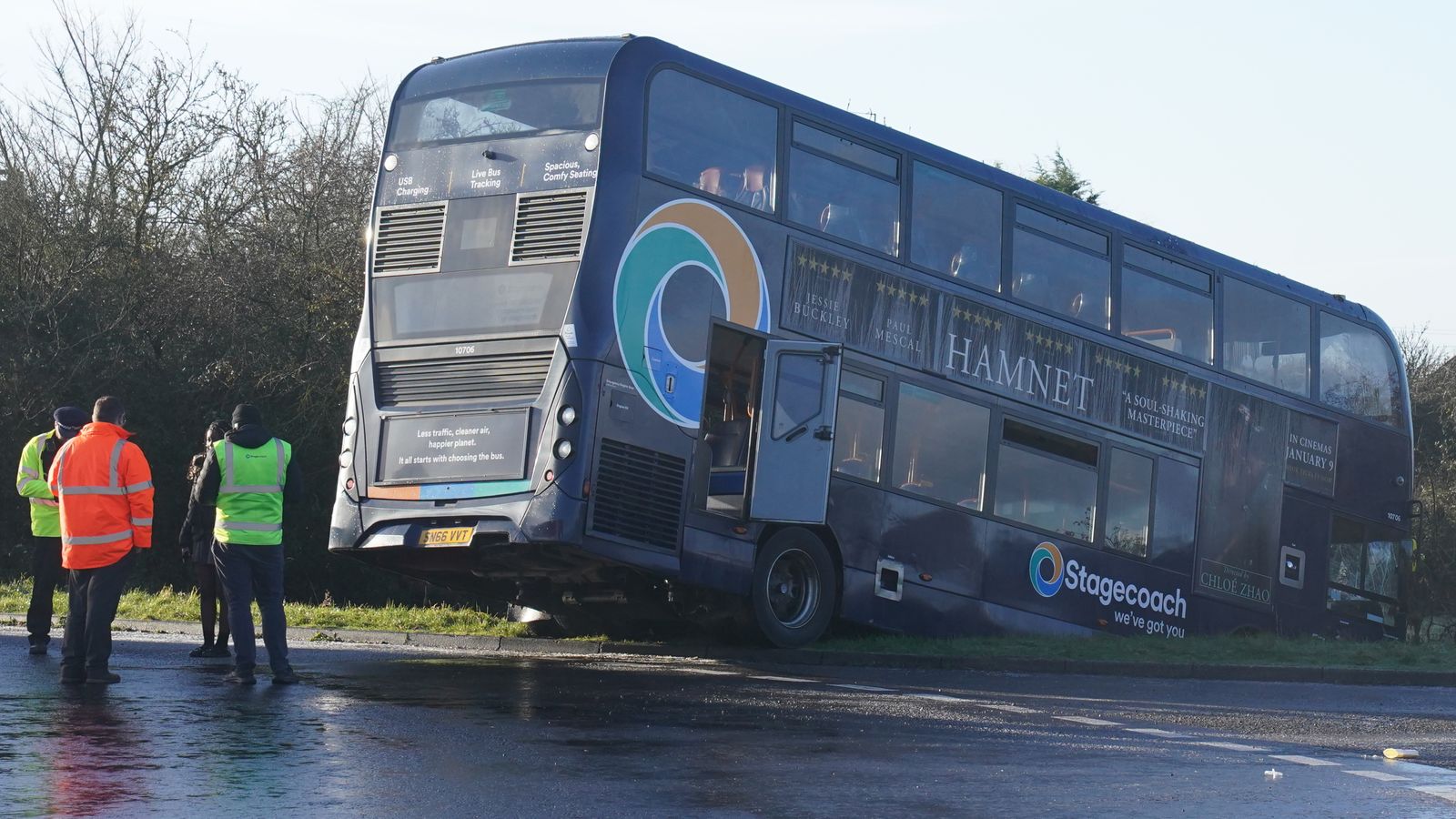 School bus crashes into ditch after slipping on black ice - as nine ...