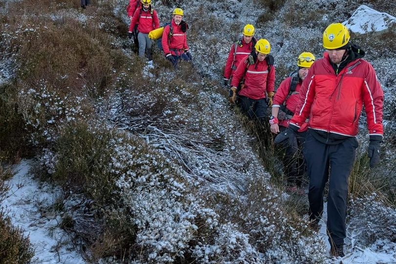 Rescue operation launched after walker gets stuck scrambling up frozen ...