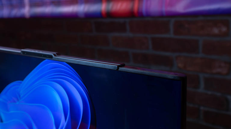 I saw Lenovo's rolling gaming laptop screen sprout an ultrawide display