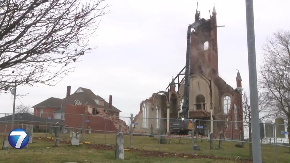 Community watches as final portion of historic Catholic church is torn down