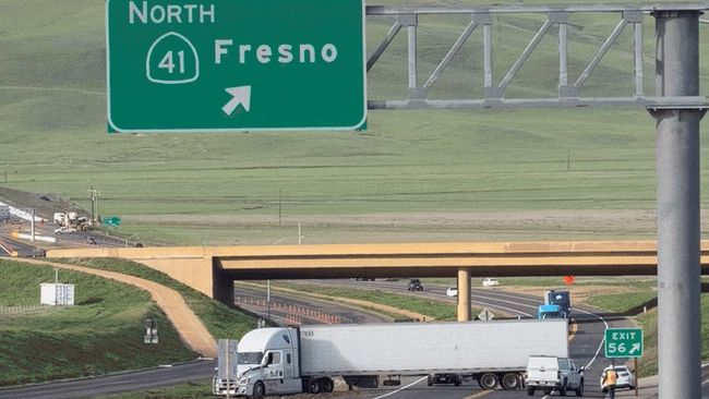 Jackknifed semi-truck blocks several lanes on California highway