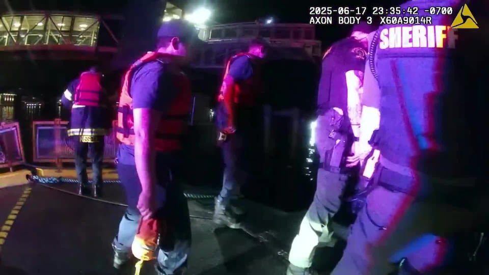 Video: New body cam shows rescue of man in water after car goes off Edmonds ferry dock<br>