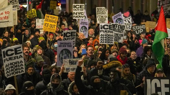 In photos: People hold vigil, protest against ICE after Renee Nicole ...