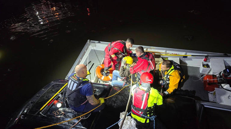 Firefighters rescue man trapped in car from icy New Jersey waters
