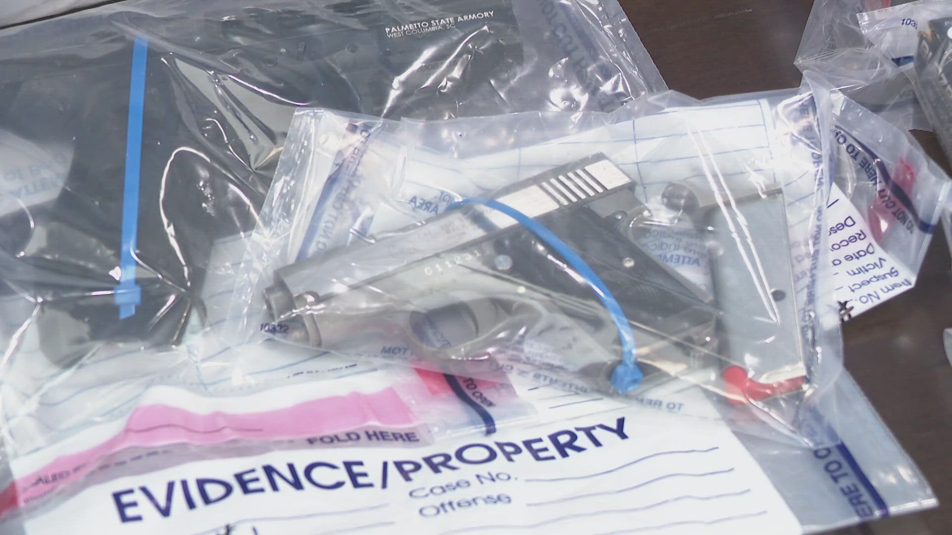 Man held without bail after alleged stash of drugs and weapons found