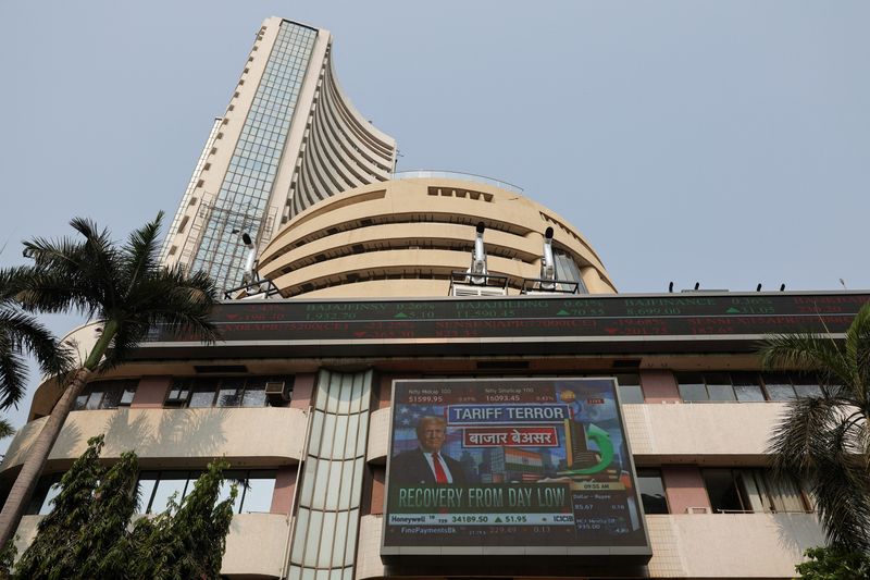 India stock benchmarks open lower as tariff worries, foreign outflows weigh<br>