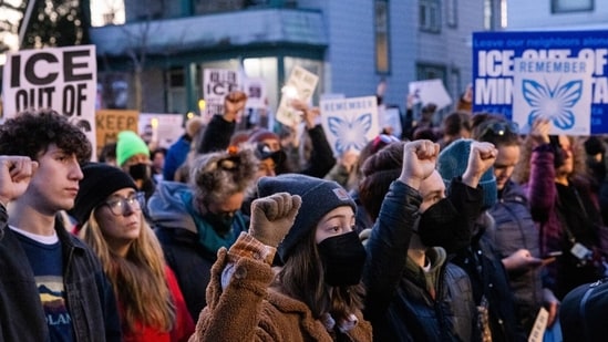 In photos: People hold vigil, protest against ICE after Renee Nicole ...