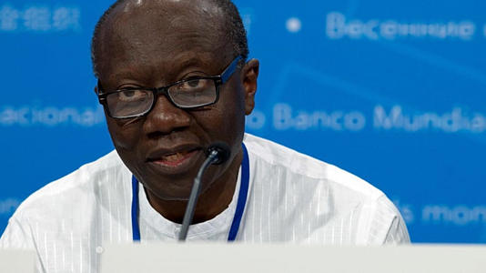 FILE - Ken Ofori-Atta, Ghana's then-finance minister, speaks during the G-24 news conference in Washington on April 19, 2018.