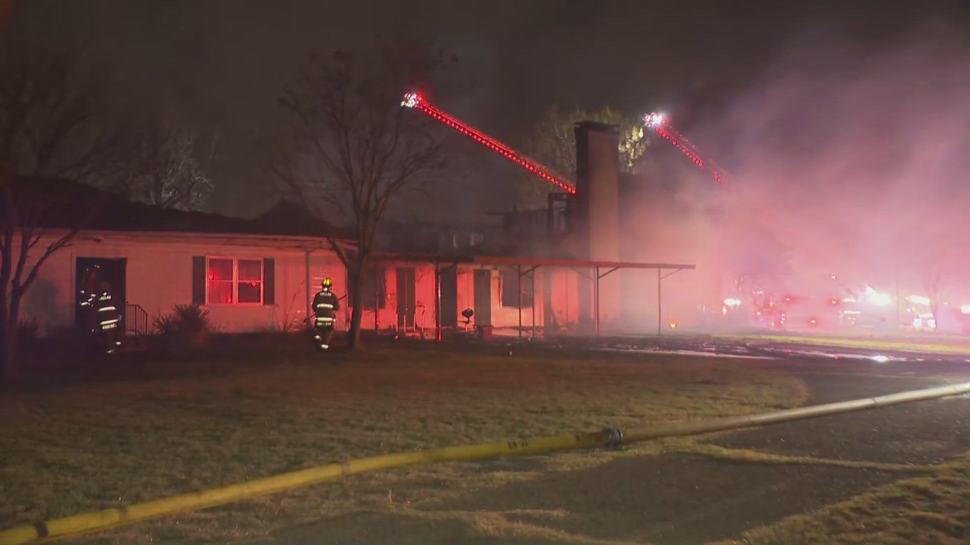 Crews work to extinguish fire at an abandoned home in southern Dallas