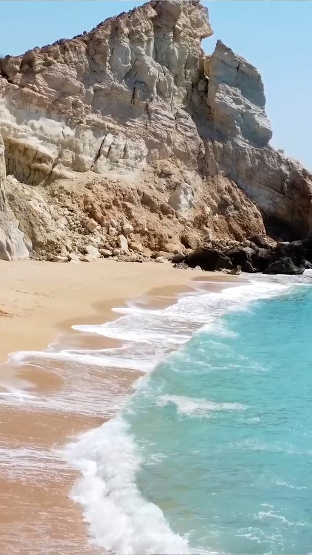 Explore the vivid tapestry of Hormuz Island from the sky